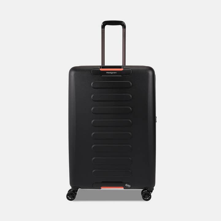 Valise extensible noire Grip L 74 cm avec roulettes silencieuses pour la vente par Hedgren France