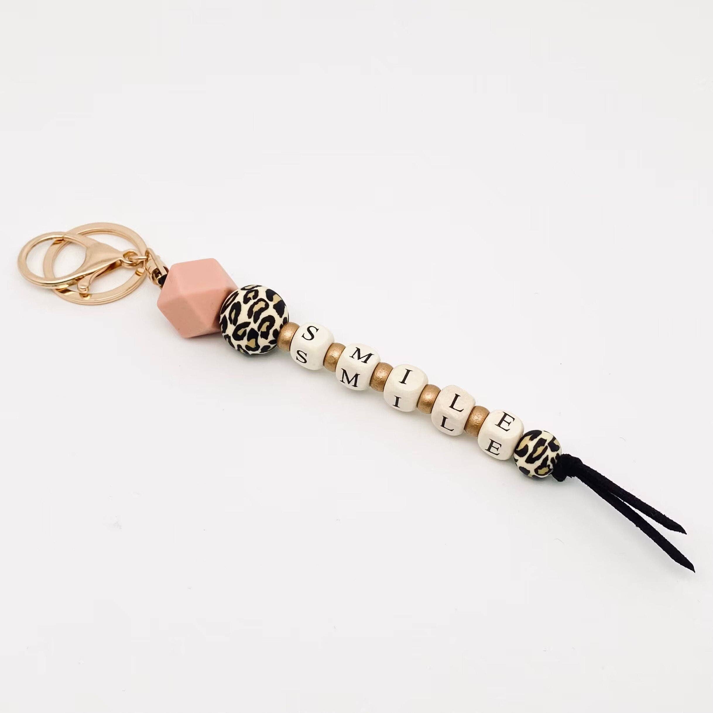 Mio Queena – wholesale Keychain – Women's – Silicone Wooden Letter Beaded Keychain1