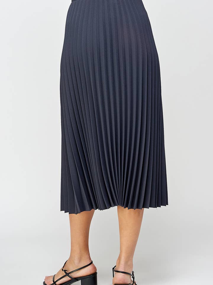 JUPE MIDI PLISSÉE EN CRÊPE pour la vente par Sans Souci