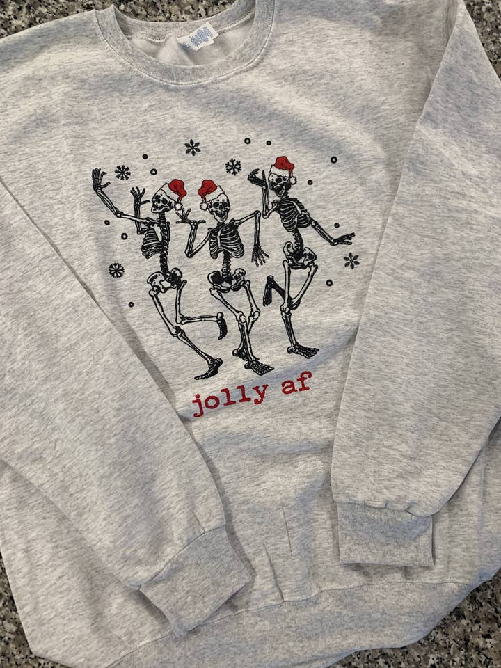 Jolly Skellie Sweatshirt for wholesale by 9 Priscilla Way