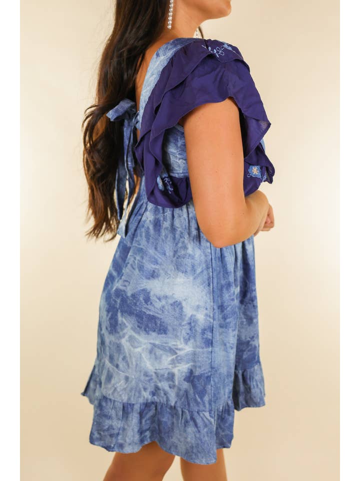 Blue Flirty Floral Tie Back Denim Dress for wholesale on Faire