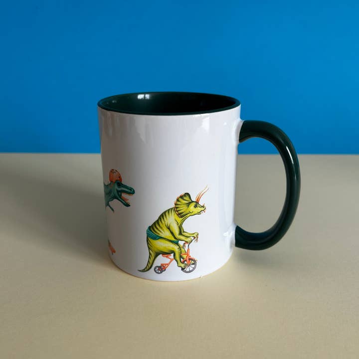 Sardines Studio - Wholesale Coffee Mug - Dinosaur Trio riding bikes mug