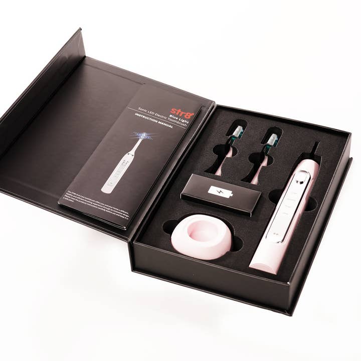 PINK Str8 Elektrische Zahnbürste mit rosafarbenem LED-Licht für den Großhandel auf Faire2