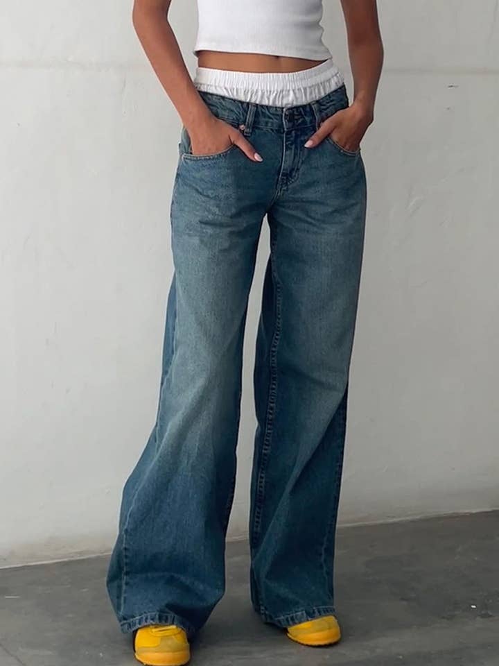 Jean vintage à taille basse et jambes larges DP25G686 pour la vente par Dipped Shop