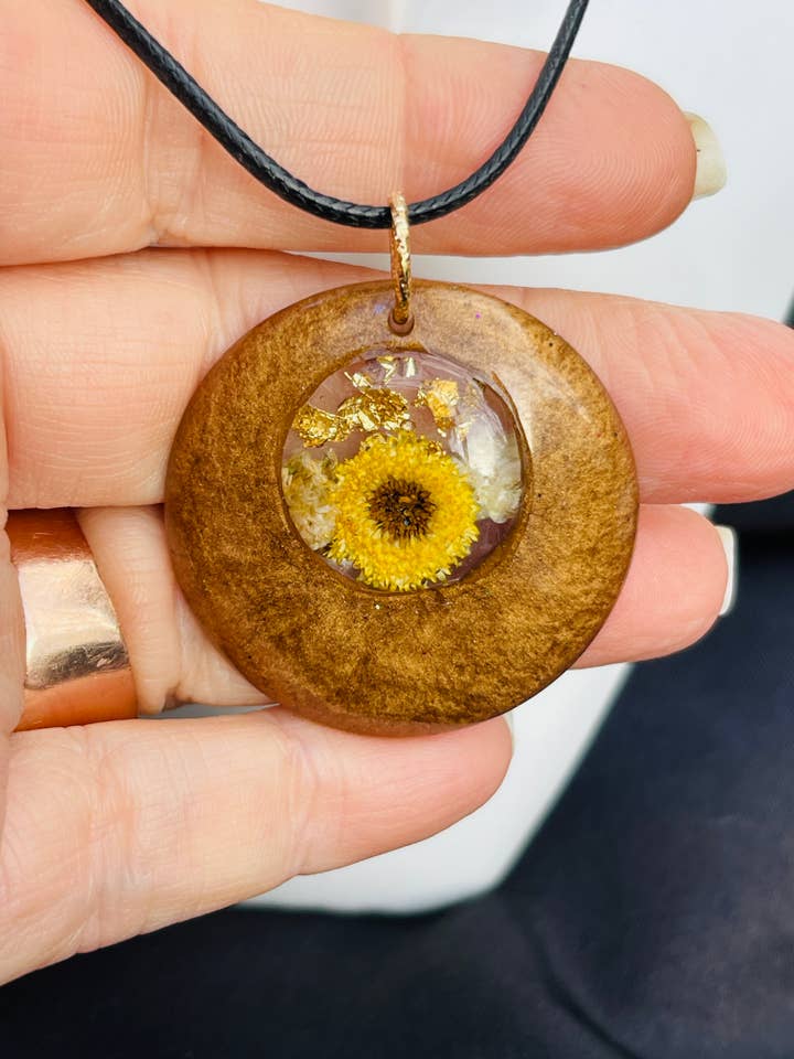 Hand dried Costmary mini carnation in resin pendant for wholesale by Handmade clay and resin Jewelry