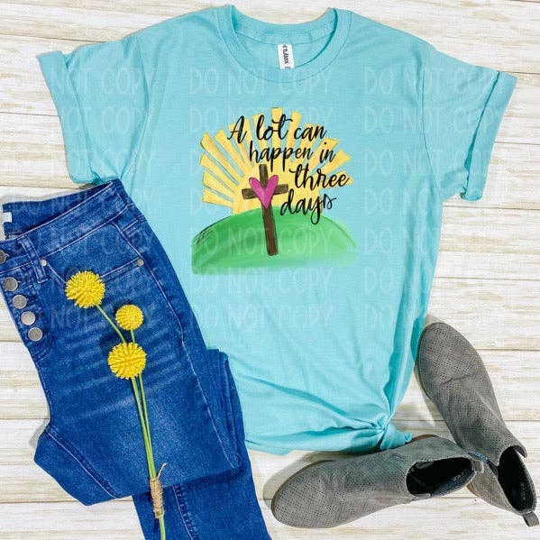 A Lot Can Happen In Three Days Heather Purist Blue Tee for wholesale by BK Designs & Blanks