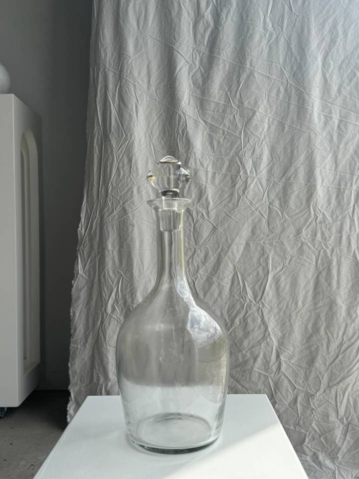 Very large glass decanter with spinning top stopper H36 for wholesale by Office Objets
