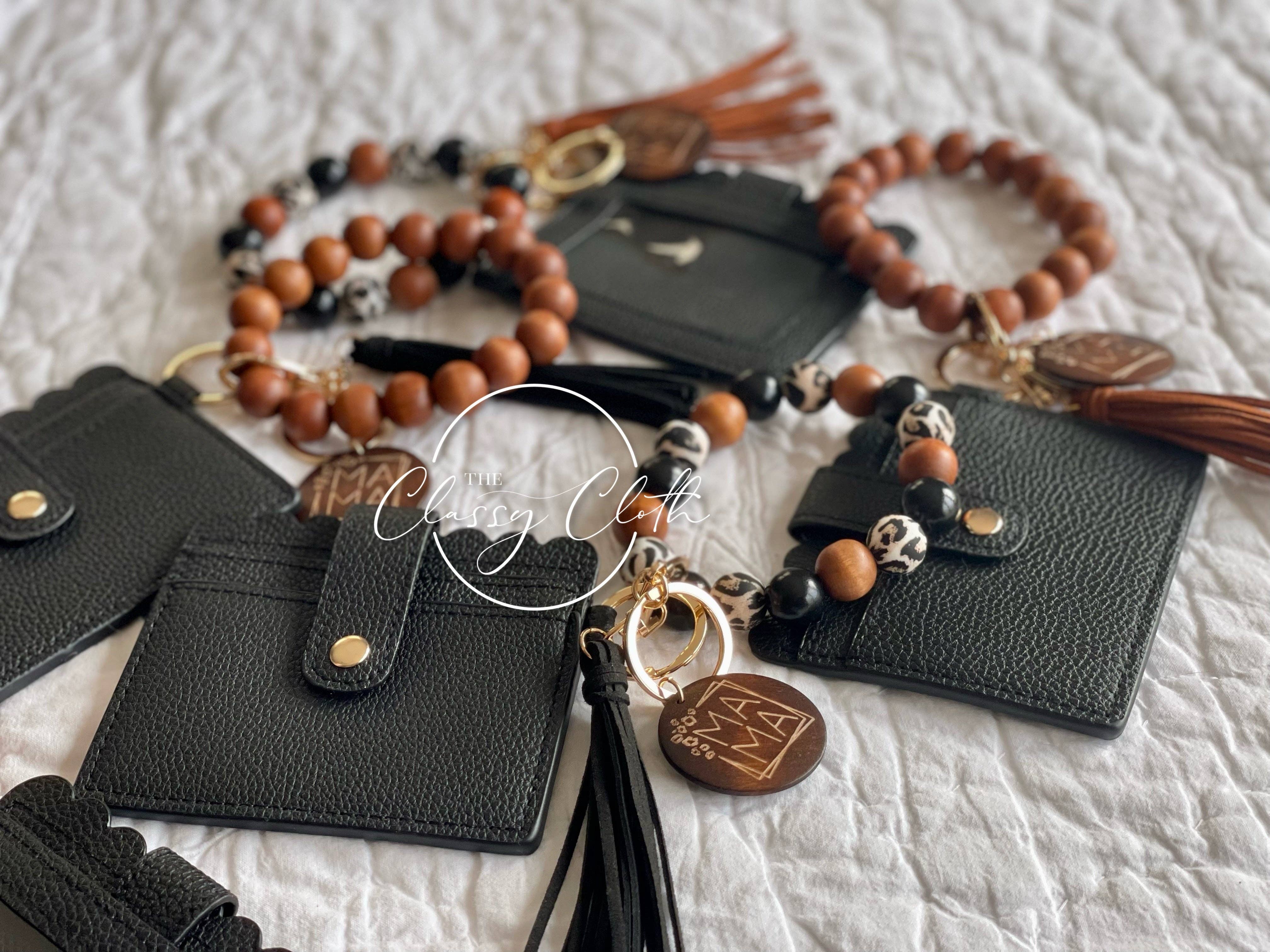 The Classy Cloth WS - Vente Bracelets - Portefeuille porte-clés MAMA Wristlet - Léopard avec pompon noir RTS5