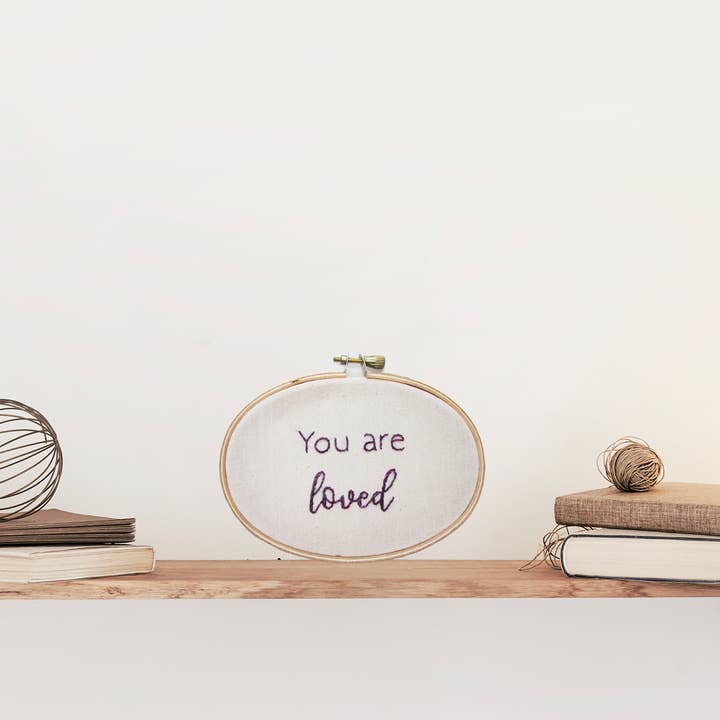 Affirmation hand embroidered wall decor - You are loved for wholesale by Bailey Whin