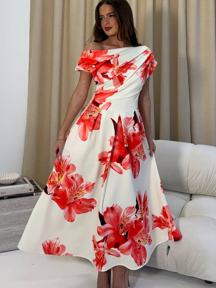 BETTY asymmetrische midi-jurk met bloemenprint oranje voor wholesale door Girl in mind