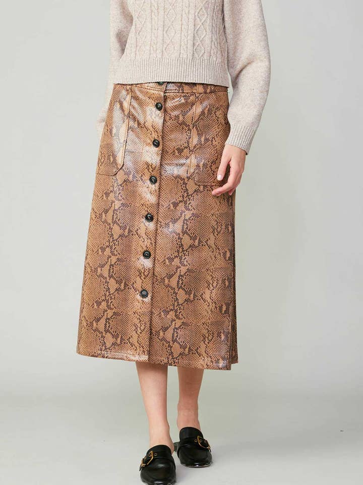Jupe midi imprimée serpent pour la vente par Current Air
