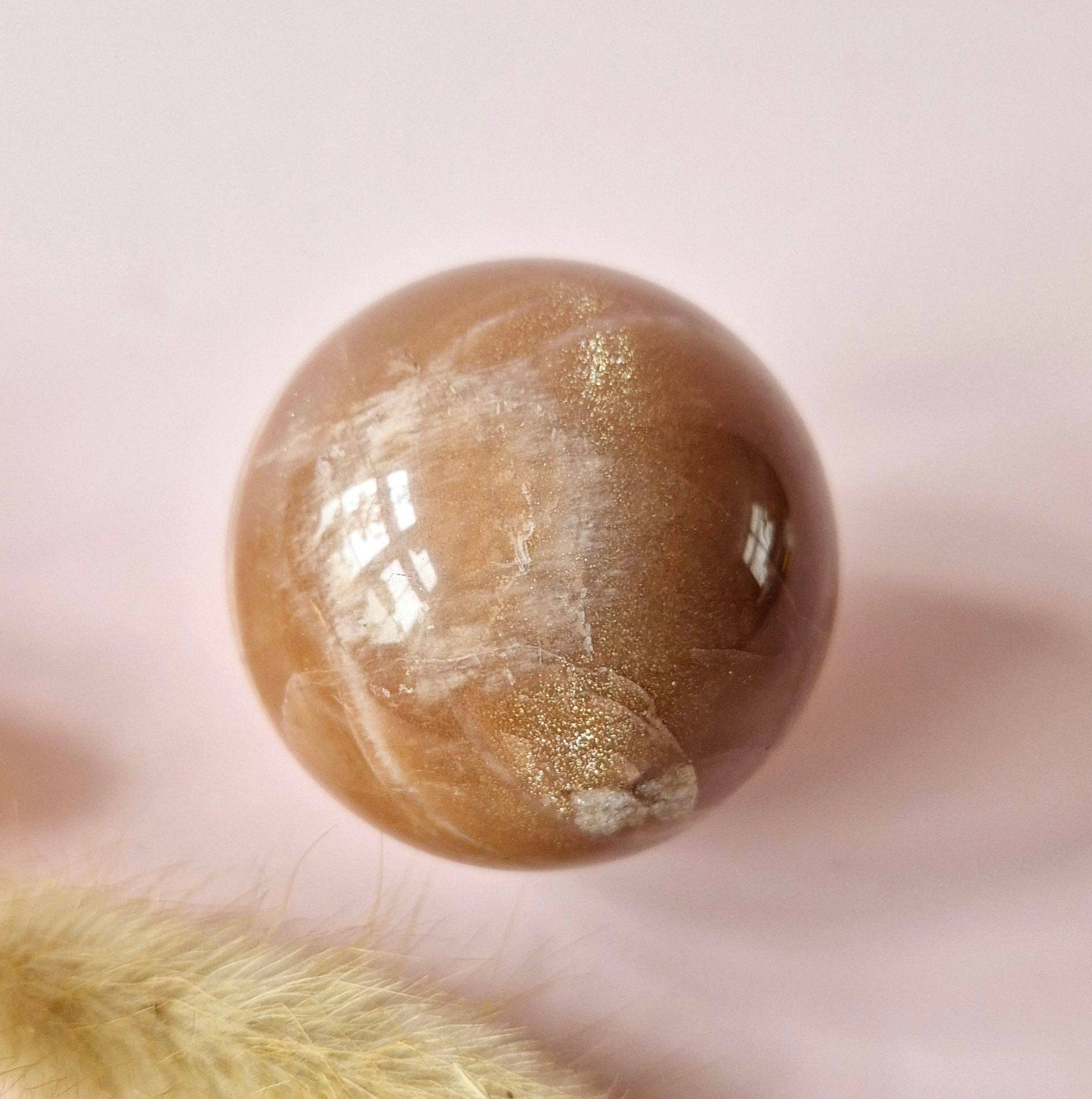 Moonlight Gemstones - Wholesale Spiritual Stone/Crystal - Crystal Gemstone Golden Sunstone Sphere with Blue & Gold Flash | 45–63 mm sphere15