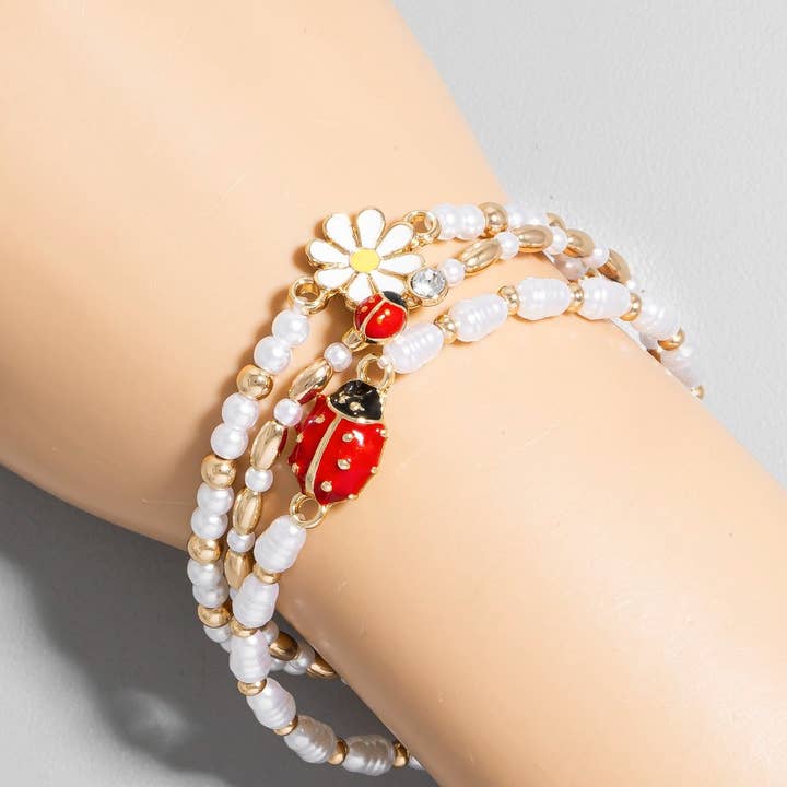 G Enamel Flower And Lady Bug Pearl Beaded Bracelet Set for wholesale on Faire3