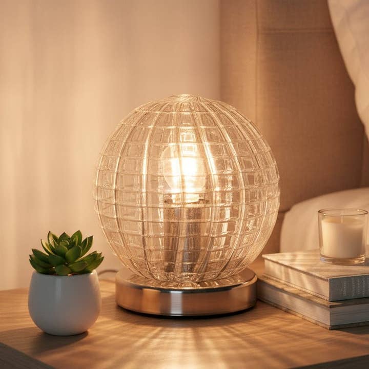 Textured Clear Glass Globe Lamp with Metal Base and other Purchase Wholesale light globes. Free Returns & Net 60 Terms on Faire trending on Faire.