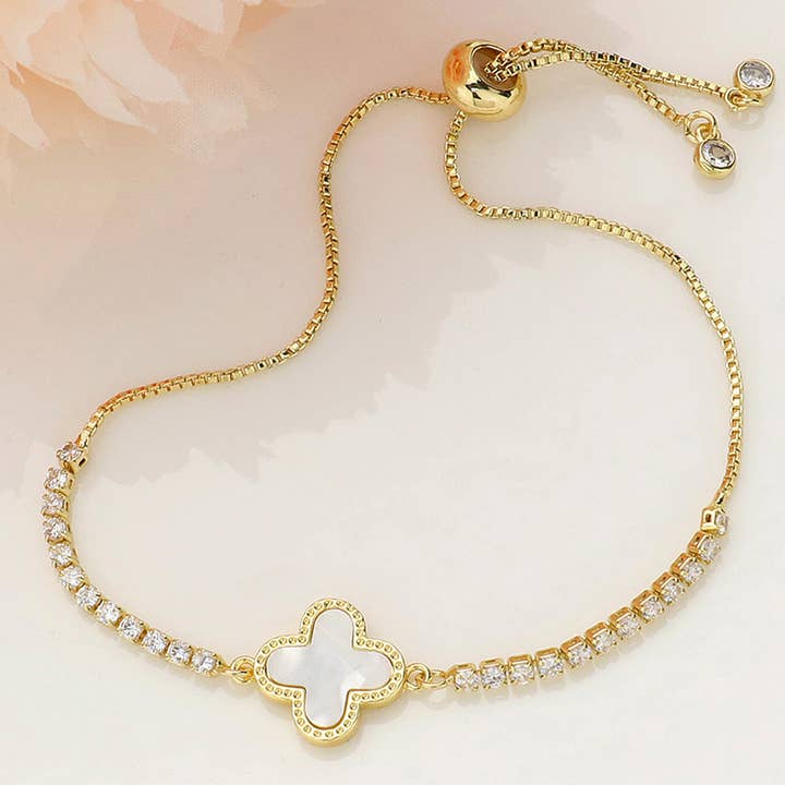 Mother Of Pearl Quatrefoil Brass Round CZ Pull Tie Bracelet for wholesale by Sensibling Corp.