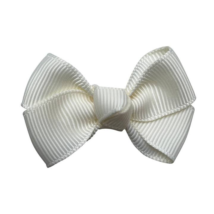 Estelle hair bow with clip in ivory for wholesale by La Fillette Accessories