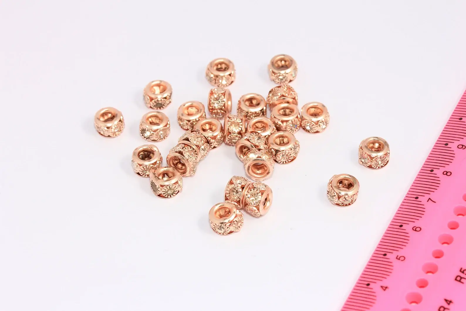 QueenJewelryM – wholesale Beads – 5,5mm Rose Gold Plated CZ Micro Pave Wheel Beads, MTE10650