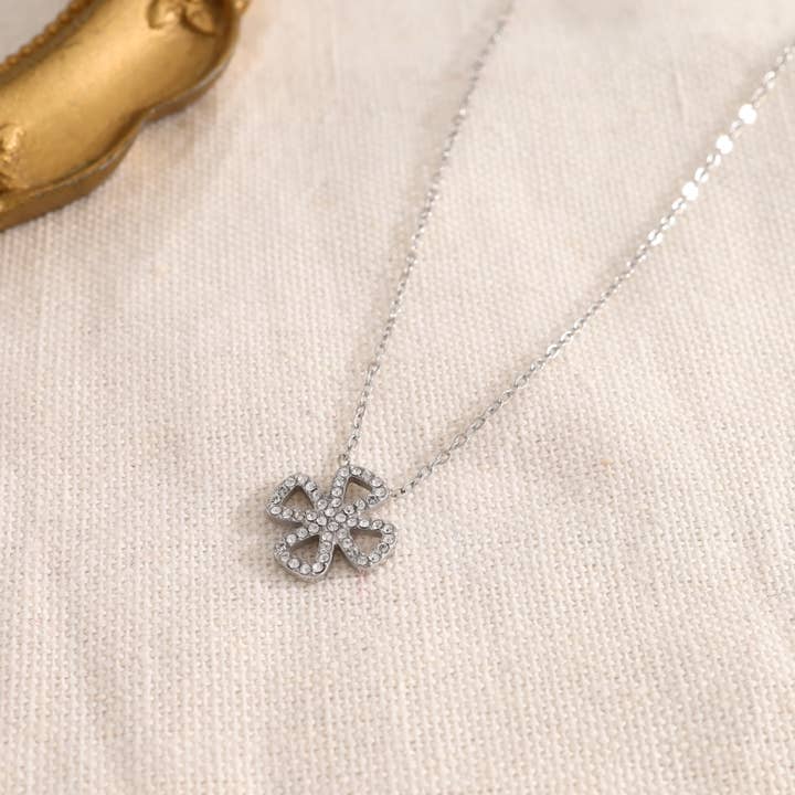 Silver necklace with four-leaf clover adorned with rhinestones for wholesale by joya