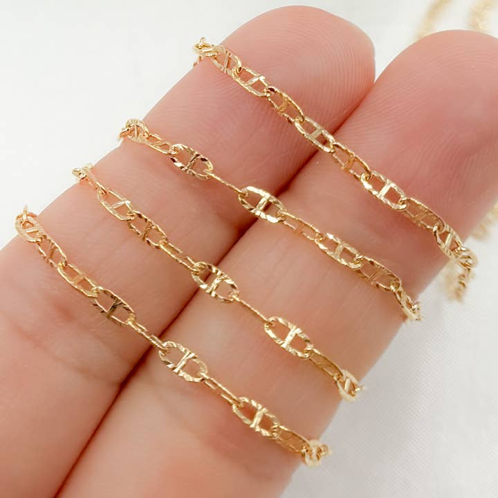 V247GF. Chaîne à maillons Marina en or rempli 14K avec facettes diamantées pour la vente par Tresor Jewelry Inc.