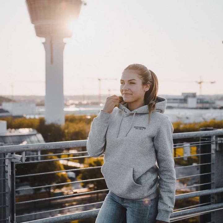 LTD. Moletom feminino com capuz em algodão orgânico "Globe" por atacado de Enzo Escoba | est. 2017