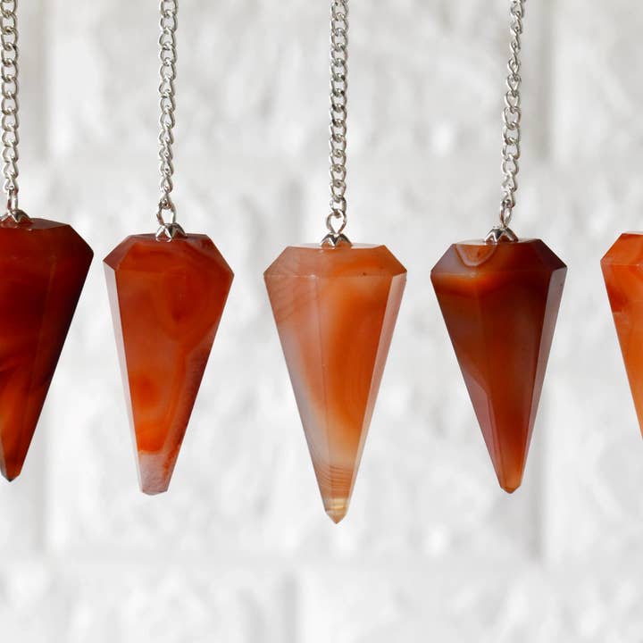 Dowsing Pendulum | Carnelian | Faceted | Crystal Pendulum and other Purchase Wholesale carnelian. Free Returns & Net 60 Terms on Faire trending on Faire.
