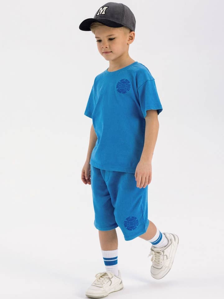 Ensemble t-shirt à manches courtes et short pour garçons bleu 3-14 ans pour la vente par Minoti sp. z o.o.