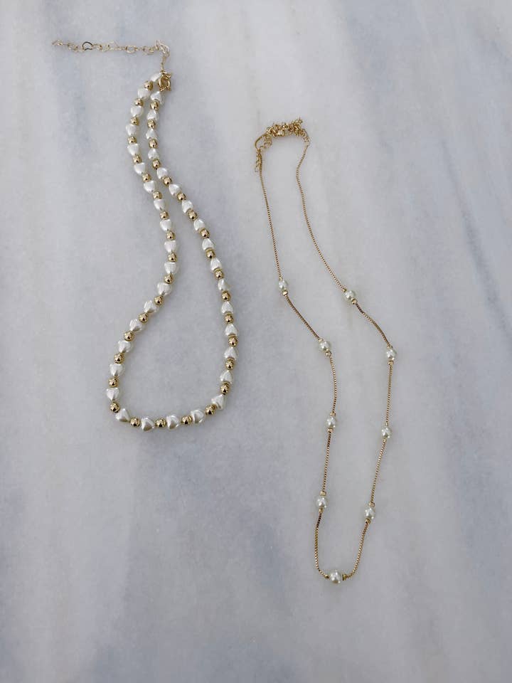 Mini Hearts Layering Necklace Pearls Gold for wholesale by Carolina Benoit