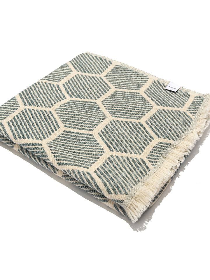 Hive Decke aus türkischer Baumwolle mit geometrischem Muster, Marineblau
für den Großhandel von InfuseZen