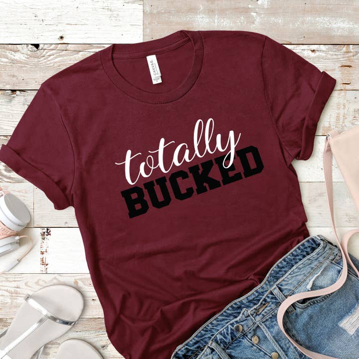 Totally Bucked T-Shirt - Now available in over 150 colors! for wholesale by Bow-Dacious Designs