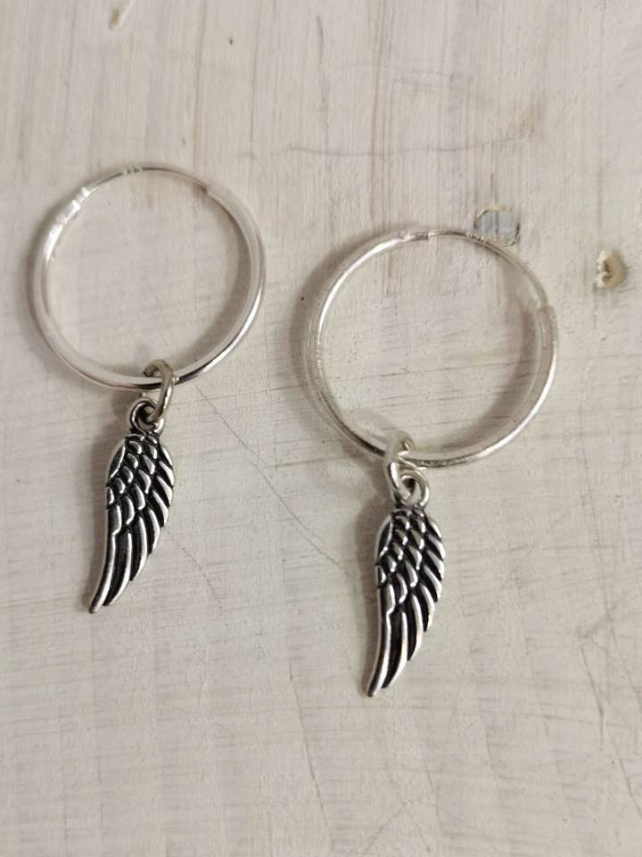 Silver Hoop Earrings with Angel Wing Charms for wholesale by Blue Marble Jewellery
