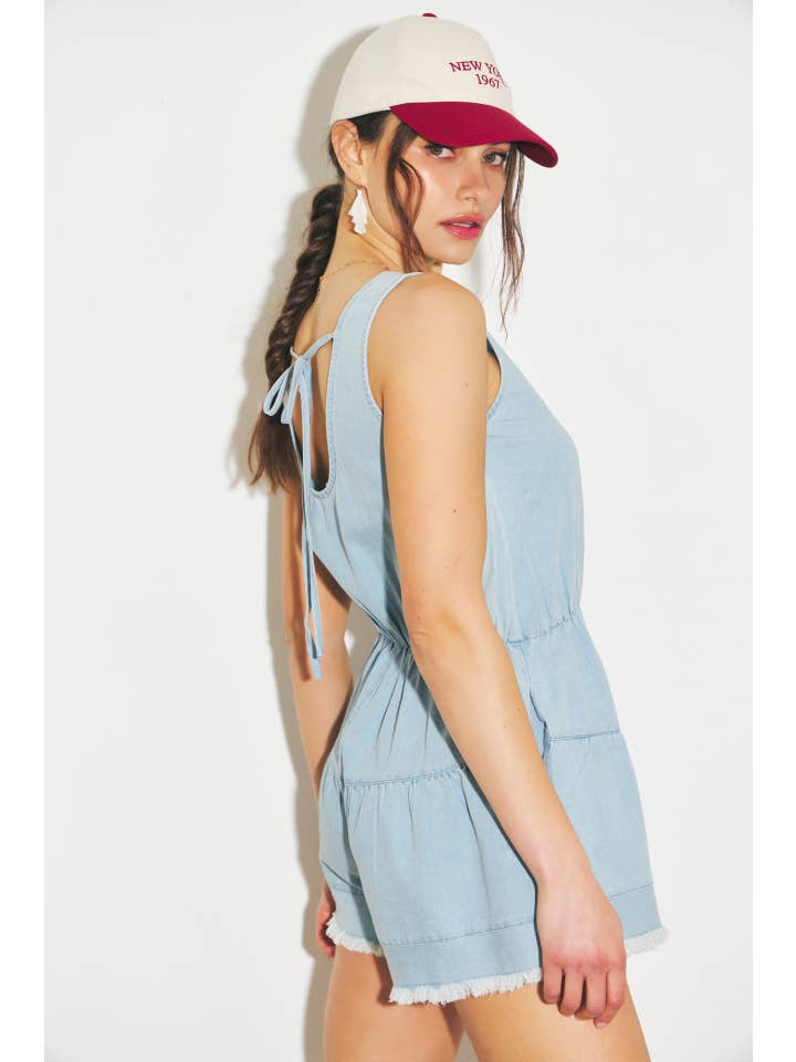 WASHED DENIM ROMPER WITH DISTRESSED DETAILING for wholesale on Faire
