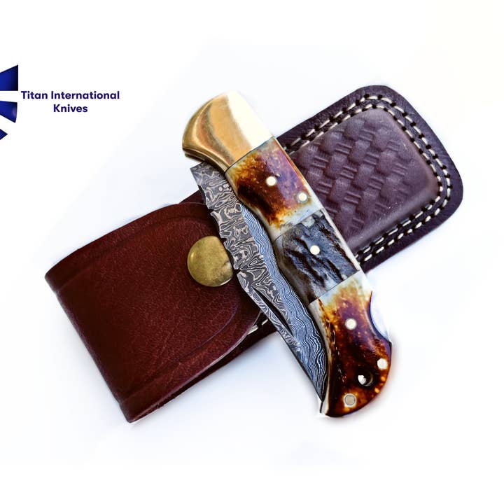 Burnt Bone and Stag Horn folding knife with Leather Sheath for wholesale by Titan International