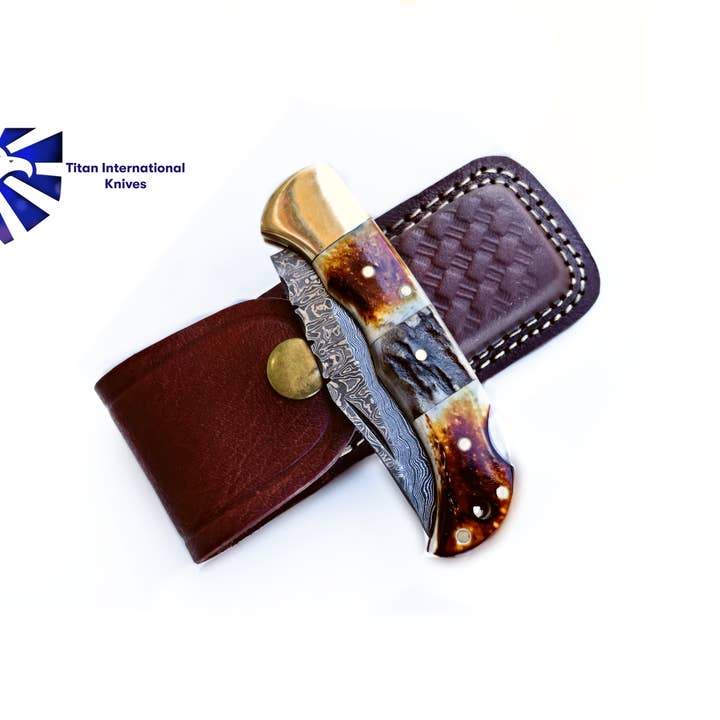 Burnt Bone and Stag Horn folding knife with Leather Sheath for wholesale by Titan International