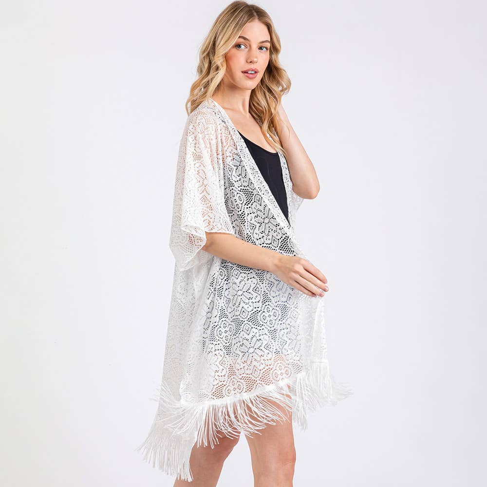 Sensibling Corp. – wholesale Swim cover-up – Women’s – Flower Pattern Crochet Lace Tassel Cover Up Poncho7