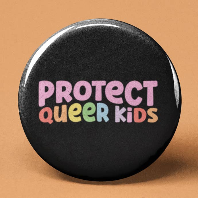Protect Queer Kids Pinback Button for wholesale by The Pin Pal Club