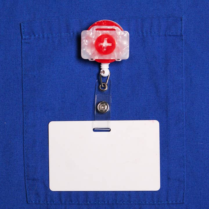 First Aid Kit Badge Reel for wholesale by COLETTE BERNARD