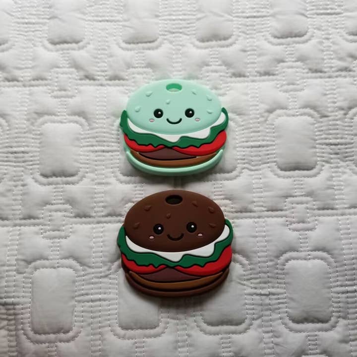 Hamburger Silicone Baby Teether and other Purchase Wholesale pane hamburger. Free Returns & Net 60 Terms on Faire trending on Faire.