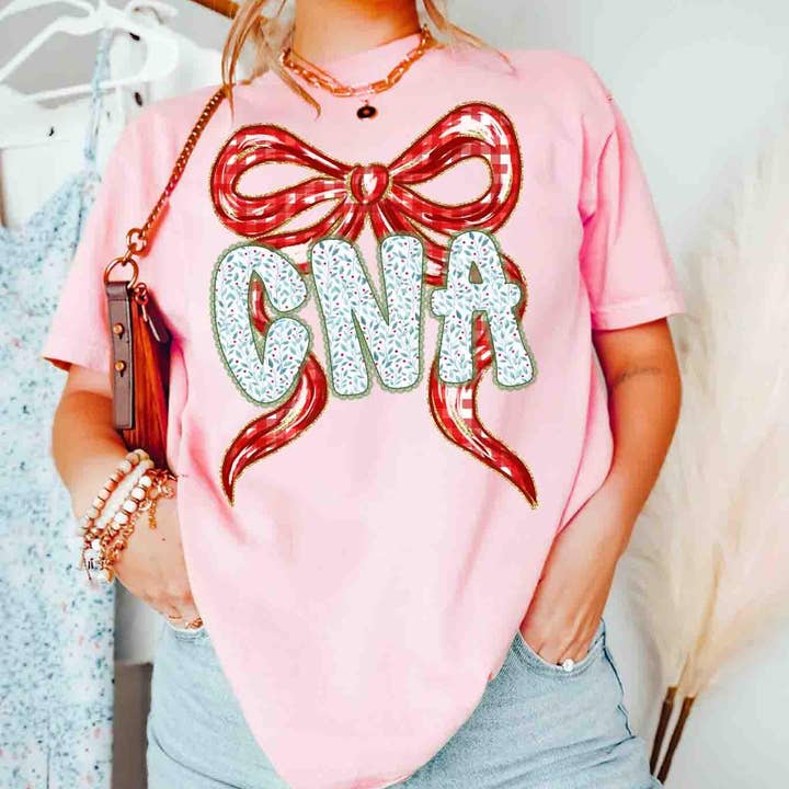 Coquette RN Np CNA CMA Christmas Shirt, School Nurse Sweater and other Purchase Wholesale np003. Free Returns & Net 60 Terms on Faire trending on Faire.