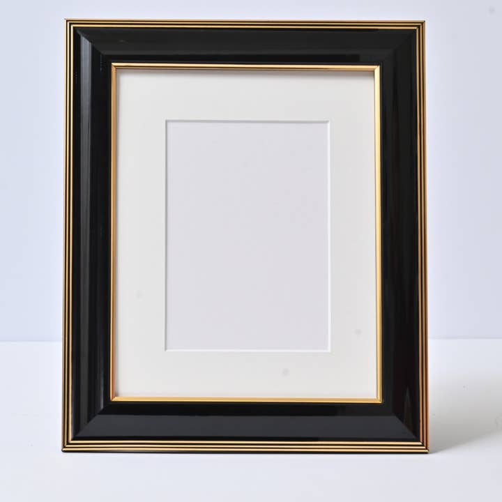 Glossy Black Finish With Gold Lines On A Classic Rounded Pro for wholesale by Riveros Frames