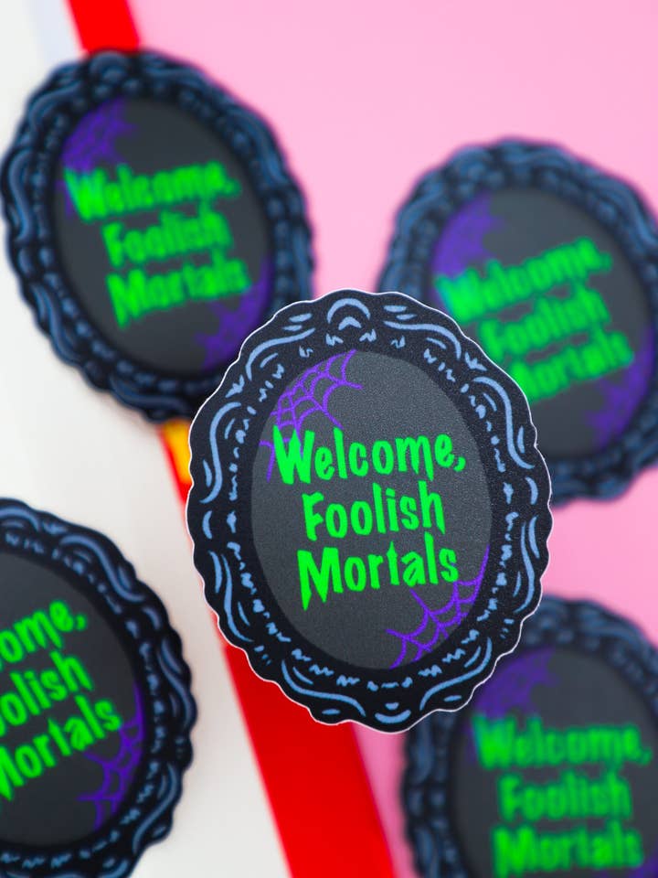 Welcome Foolish Mortals Sticker for wholesale by Furever Booked