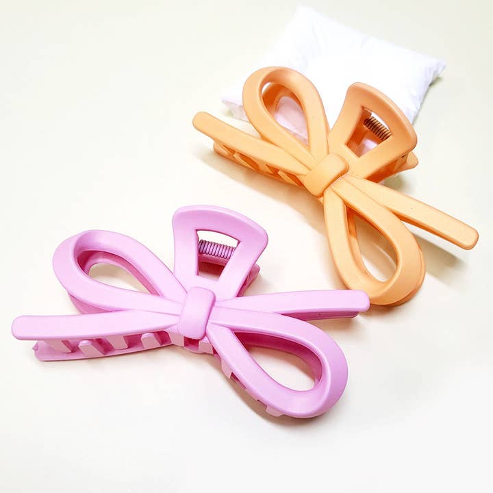 Matte Color Ribbon Shaped Hair Claw Clip for wholesale on Faire