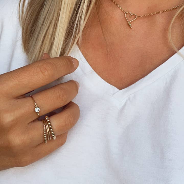 Collana cuore liscio dorato per la vendita all'ingrosso da parte di PADAM PADAM