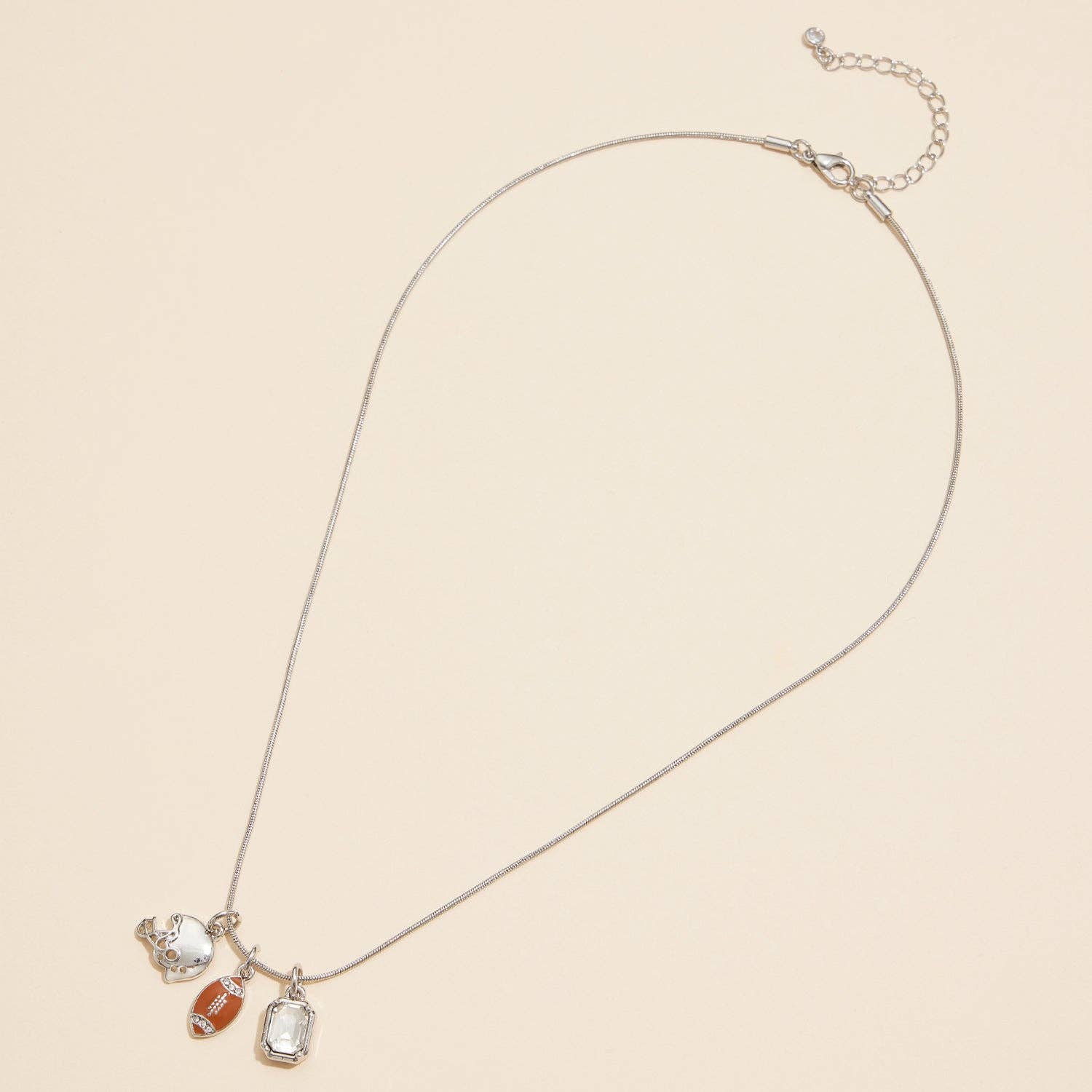 18K Gold Dipped Football Helmet Charm Necklace with Gem for wholesale on Faire4