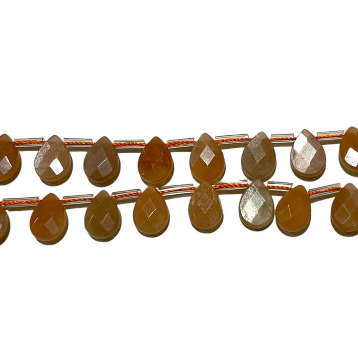 32 small faceted flat drop sunstone pendants for wholesale by Foliesbijoux