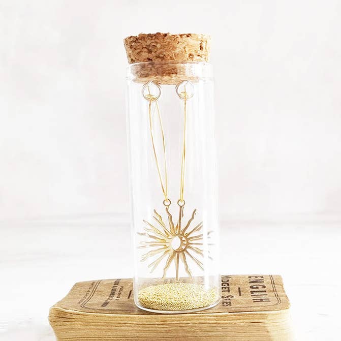 Orecchini a cerchio Starburst in oro in una bottiglia per la vendita all'ingrosso da parte di Zamsoe