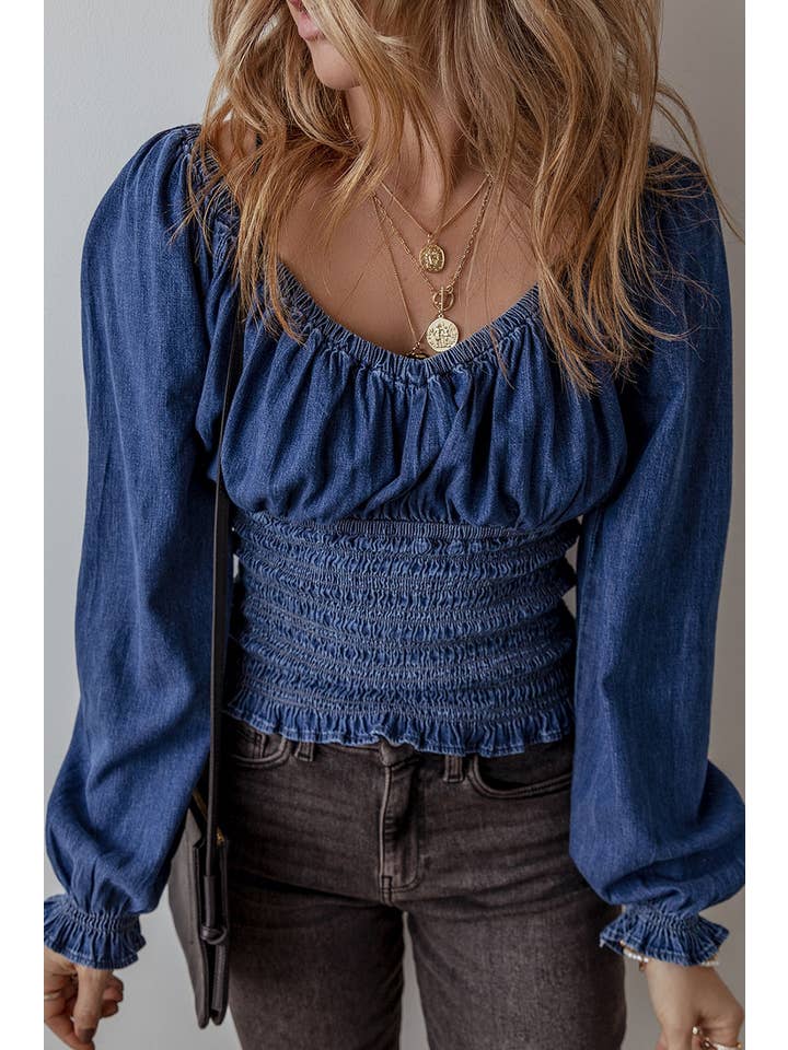 dunkelblau Jeansbluse mit gesmokten Puffärmeln für den Großhandel auf Faire