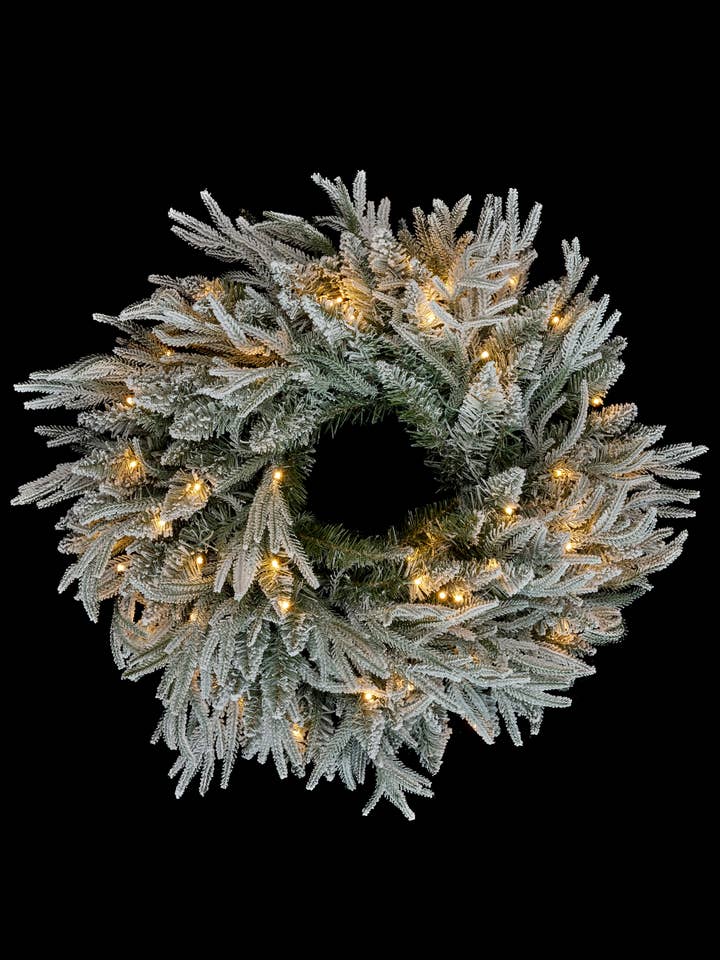 WREATH FLOCKED 135 TIPS 50LED PLST GR/WH 24X24 for wholesale by Studio Specialties