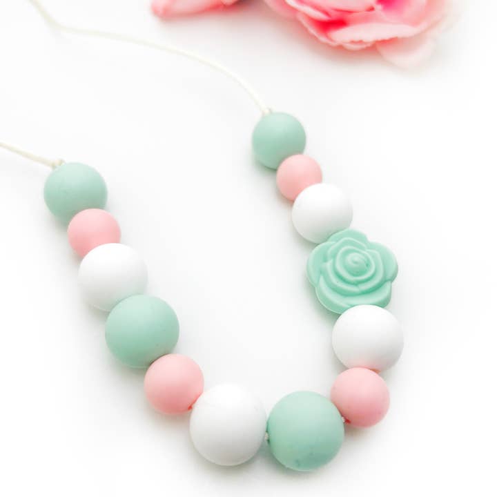 Mint Flower Kids Sensory Chew Necklace and other Purchase Wholesale silicone teething pendant. Free Returns & Net 60 Terms on Faire trending on Faire.