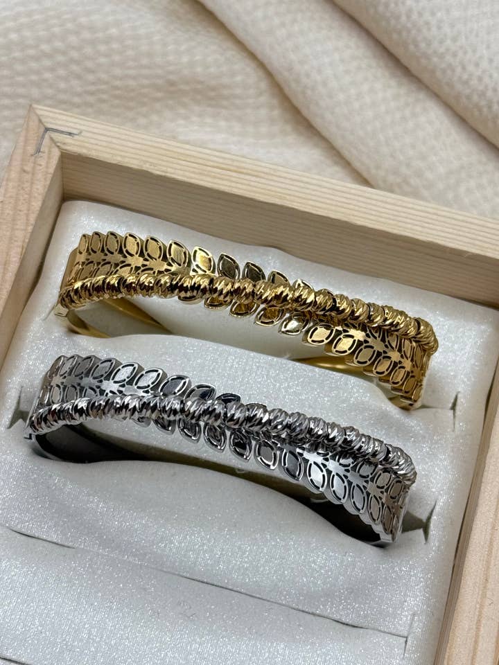 Bracciale rigido in acciaio inossidabile con foglie incrociate per la vendita all'ingrosso da parte di YOLA