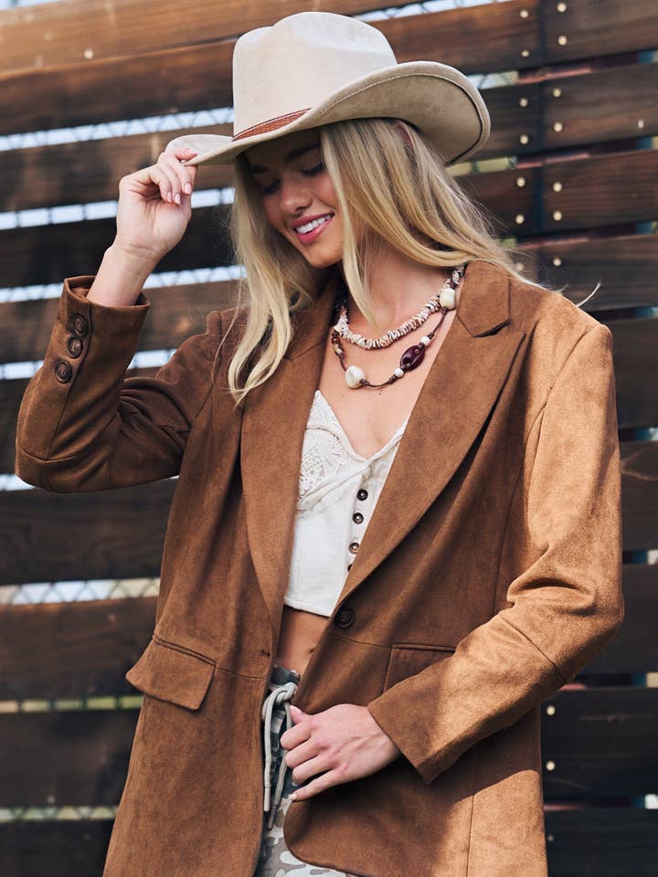 Blazer en faux daim pour la vente par Fashion Week